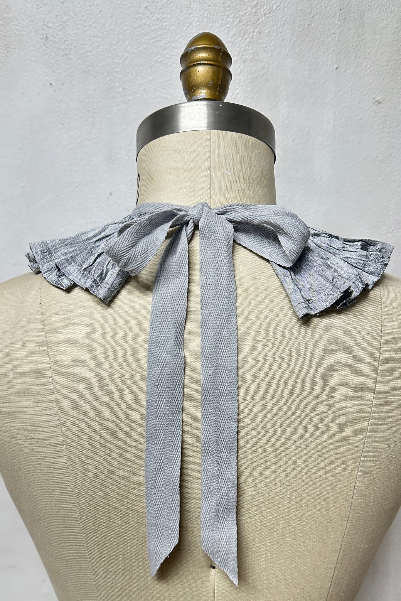 That Silk Ruffled Collar