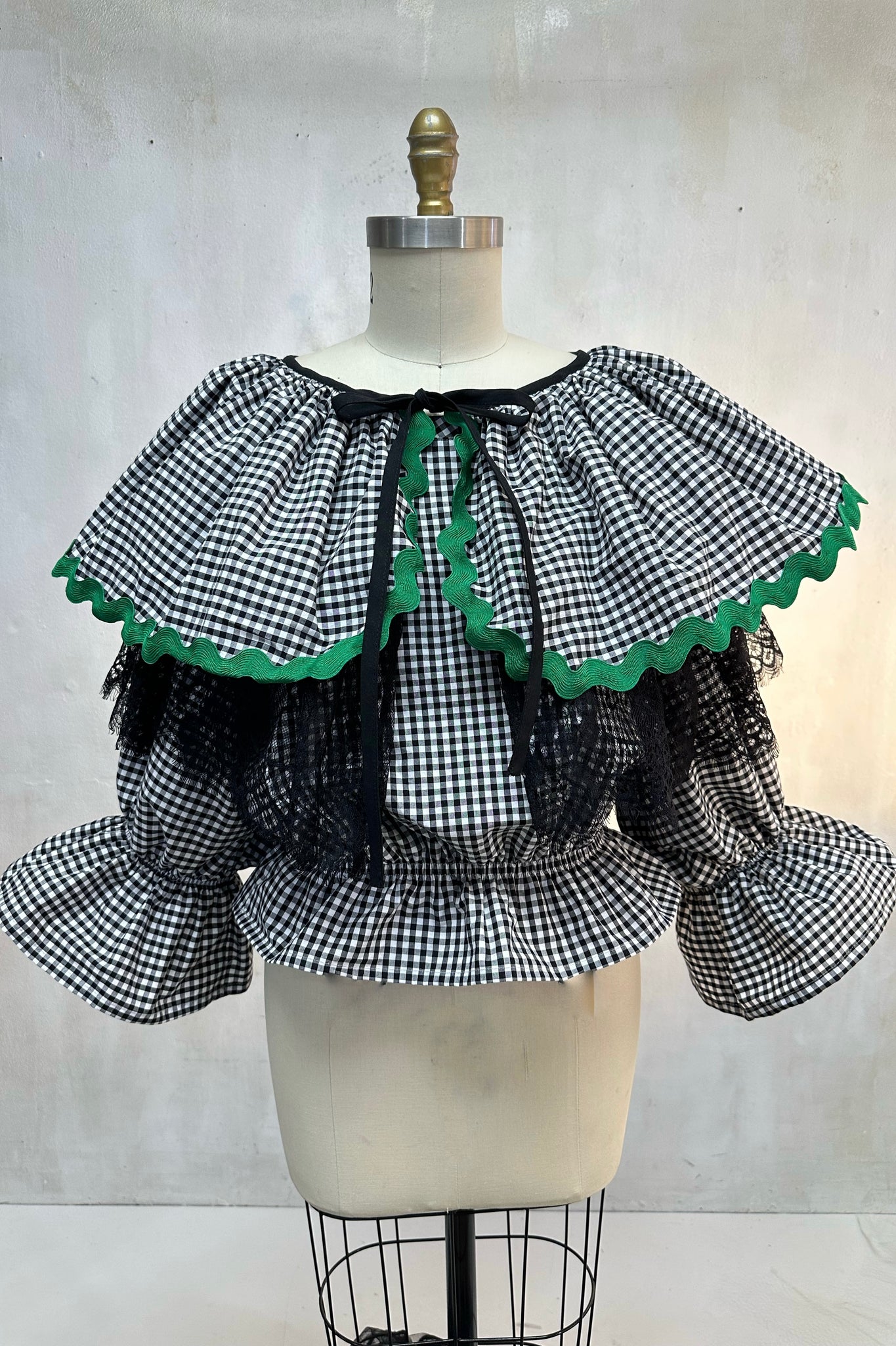That Fancy Ruffled Collar Or...
