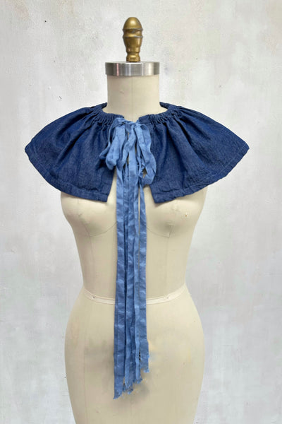 That Ruffled Collar Or...